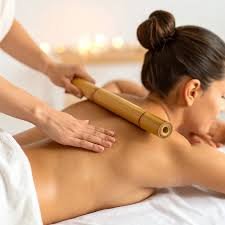 Warm Bamboo Therapy session at Aura International Thai Spa